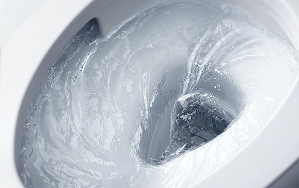 Illustration du tourbillon d'eau à l'intérieur de la cuvette de WC