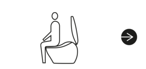 A person is sitting on a washlet.