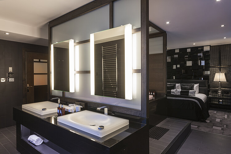 WASHLET® on a gray tiled wall