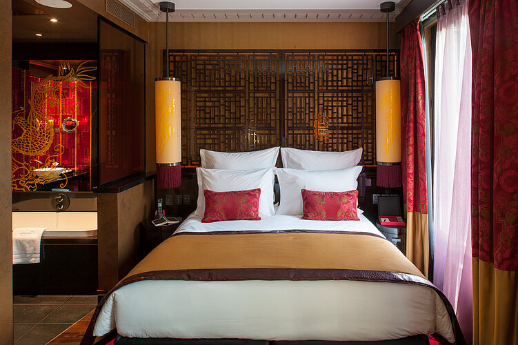 Ceiling decorations in dining room at Buddha Bar Hotel Paris