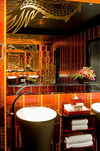 Living area in a suite at Buddha Bar Hotel Paris