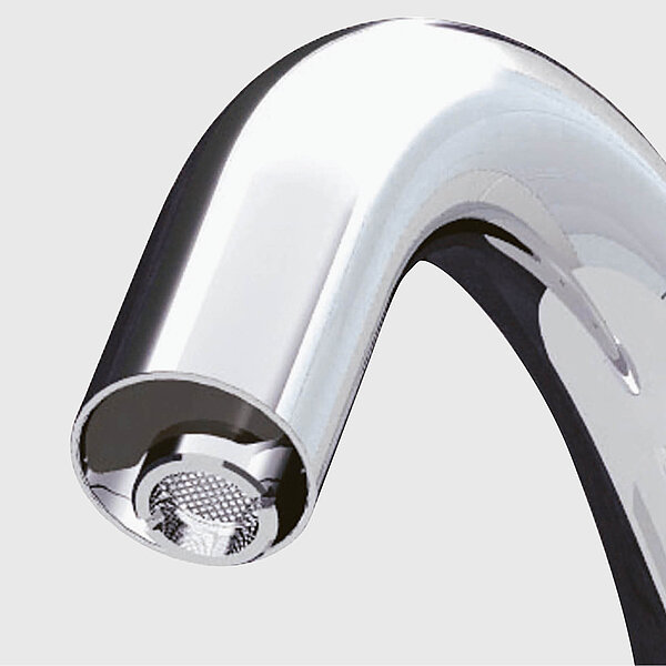 The picture shows the outlet of a fitting with a small, inconspicuous sensor mounted above it. 