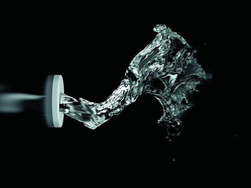 A vortex of water spirals out of a single nozzle. It is narrow at the exit and widens as it goes. 