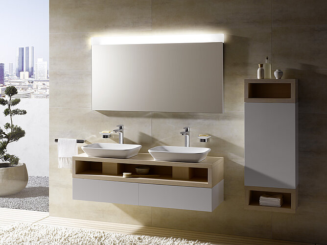 Vanity basin with single-arm fittings and skyline in the background