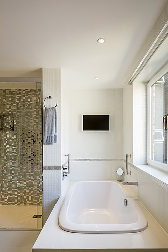 Bathroom with bathtub in Sir Stirling Moss's private residence in London