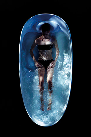 Bird's-eye view of woman in floating bathtub